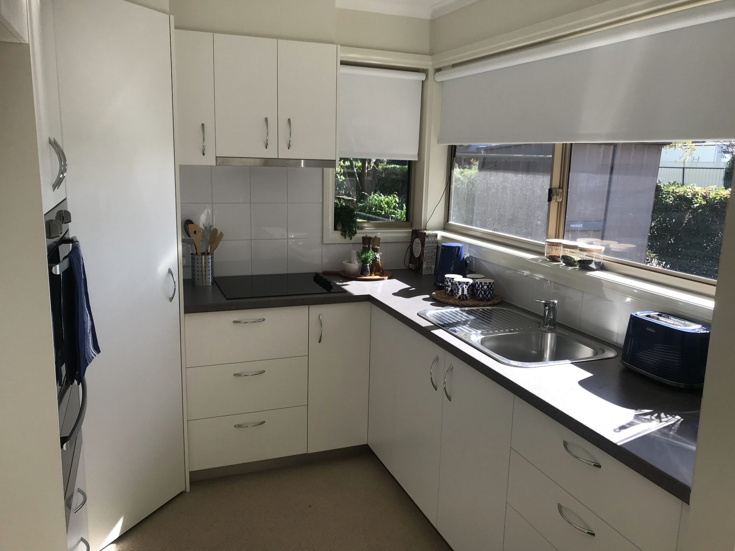 White kitchen unit at a home in Mercy Place Rice Village