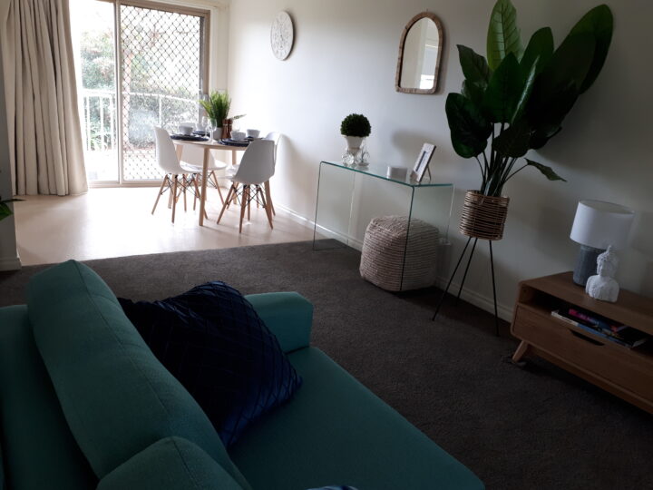 Modern Lounge and dining area at Mercy Place Rice Village